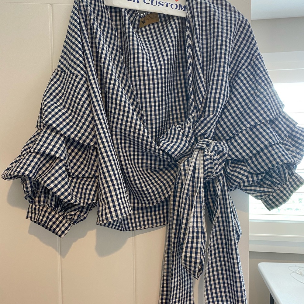 puffy sleeved top with tie at the bottom